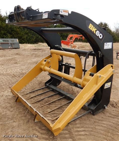 shredder skid steer bale processor|round bale cutter for skidsteer.